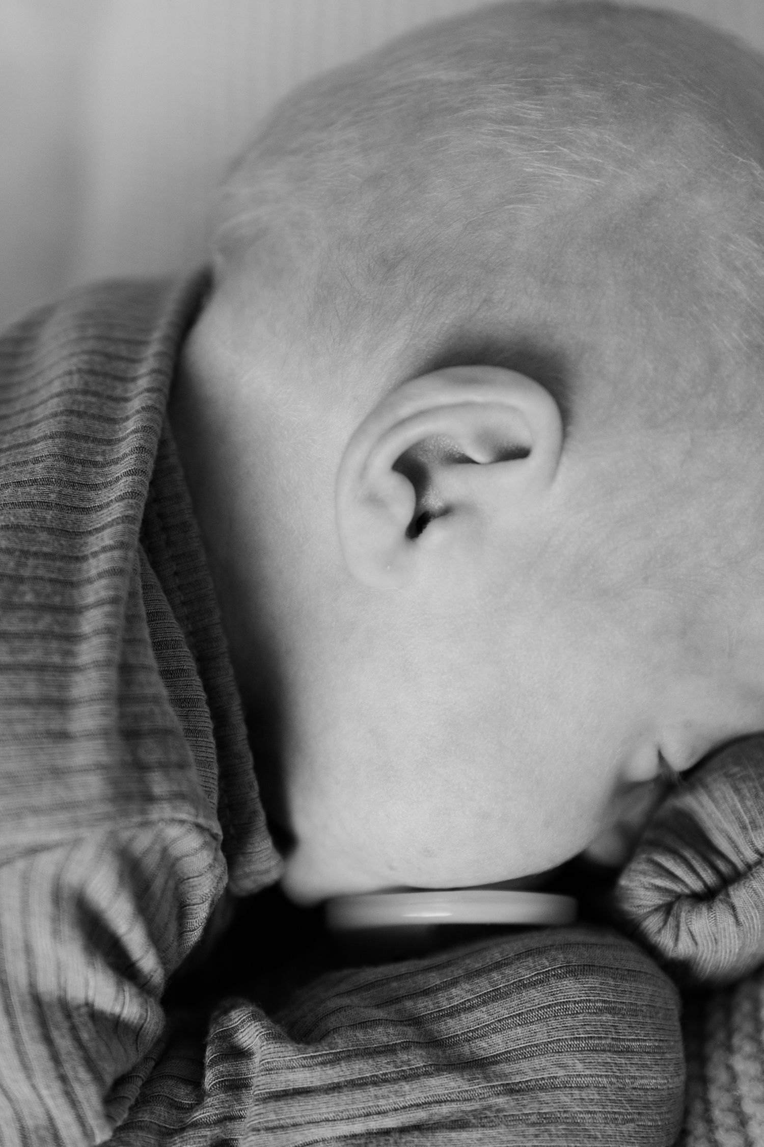 b&w close up of baby's ear