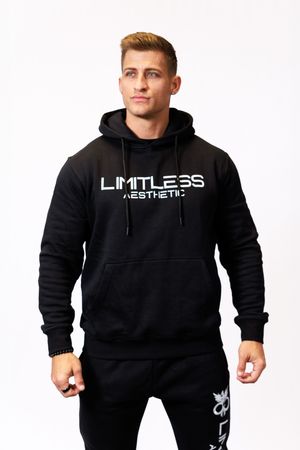 Athletic model wearing black Limitless hoodie and matching sweatpants shown from three different angles.