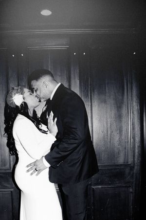 A series of romantic black and white photos showing a couple in formal attire sharing tender moments together.