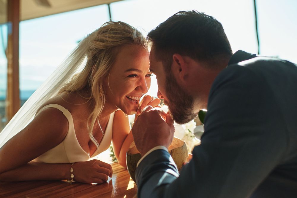 Intimate romantic moments captured during sunset at a wedding reception.
