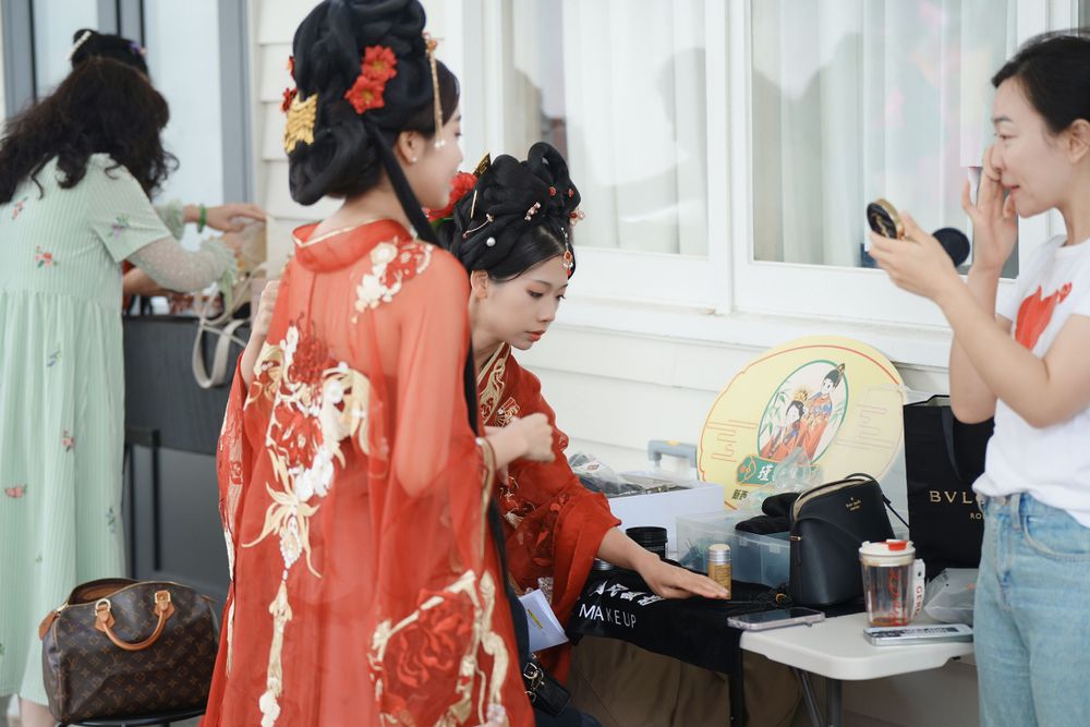 Group photo of performers in Hanfu at a Chinese Traditional Music Concert, captured by an Auckland event photographer.