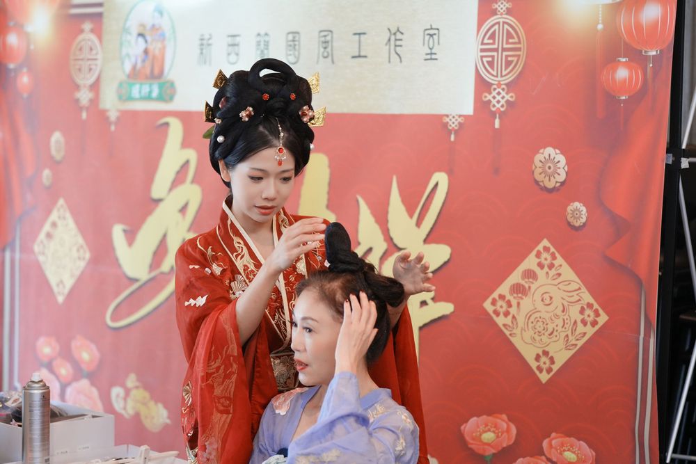 Group photo of performers in Hanfu at a Chinese Traditional Music Concert, captured by an Auckland event photographer.