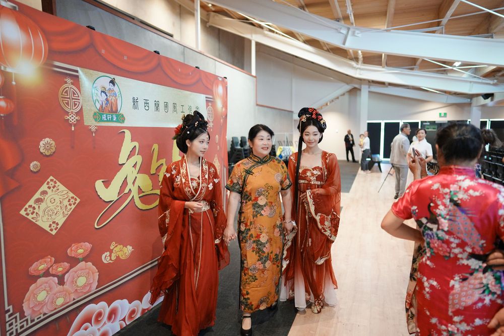 Group photo of performers in Hanfu at a Chinese Traditional Music Concert, captured by an Auckland event photographer.