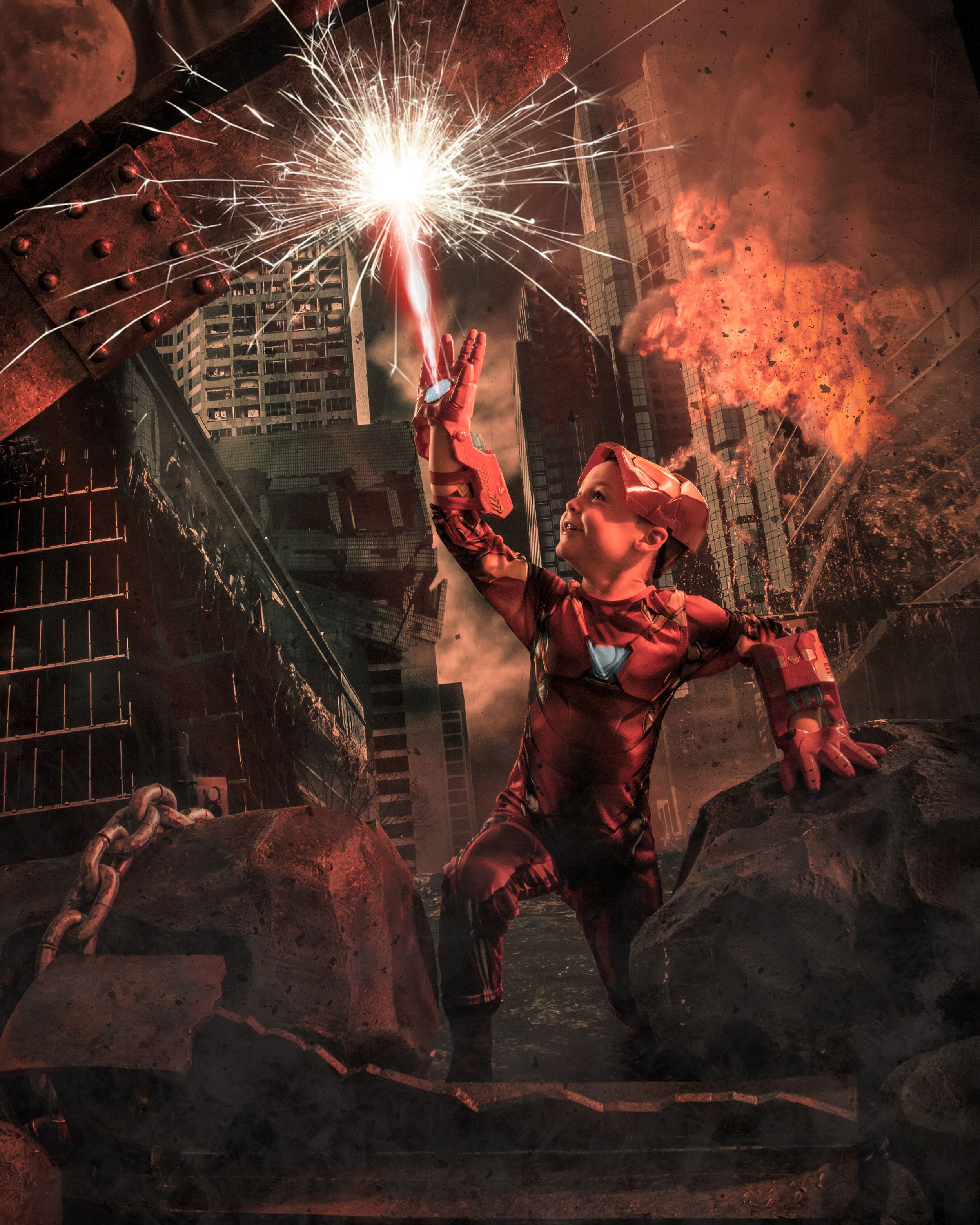 Red armored figure with sparking energy effects in destructive city scene.