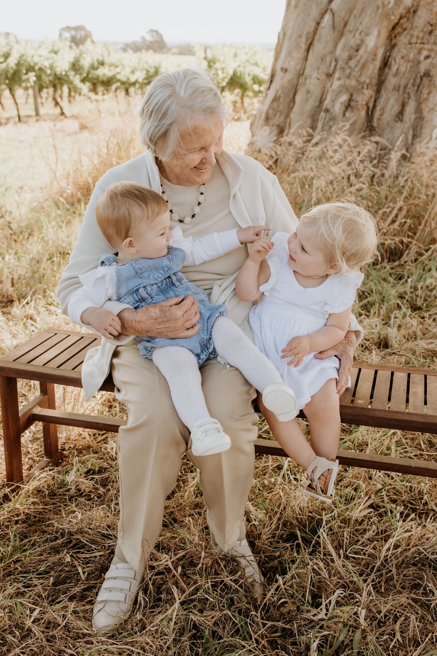 Grandparent with grandchildren, capturing the love and connection across generations.