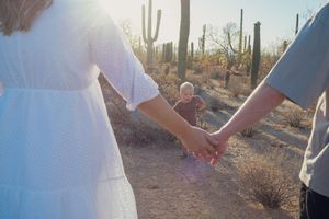 family plays together in Saguaro National Park, Tucson, Arizona, Sonoran Desert