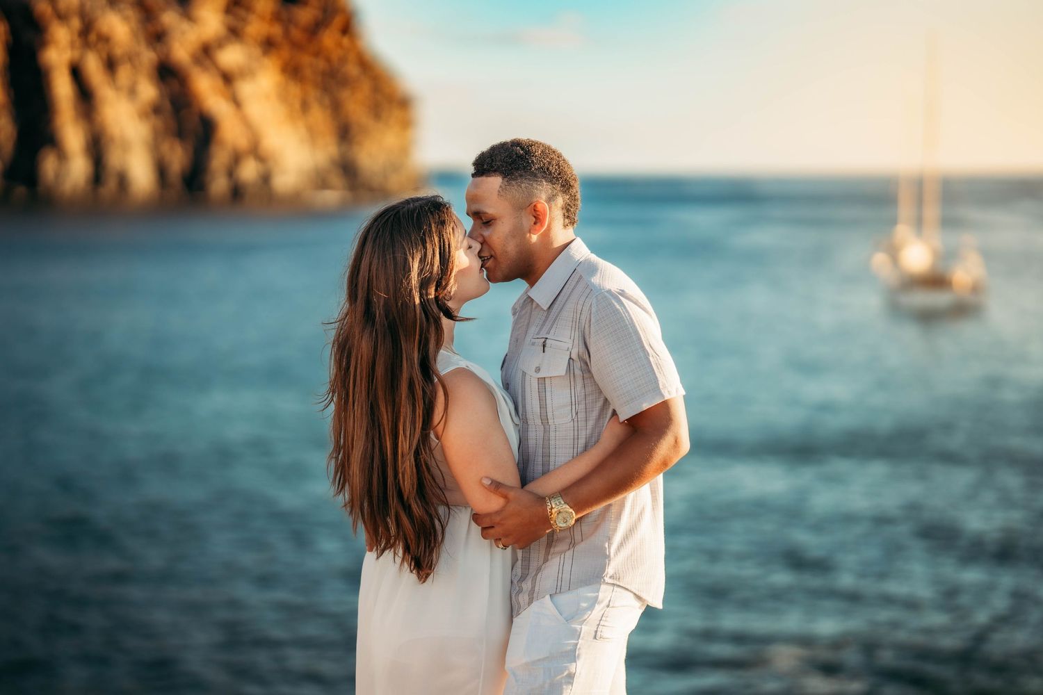 A heartwarming family photoshoot at Playa Bollullo, Tenerife, Canary Islands. Capturing joyful moments by the stunning ocean backdrop.