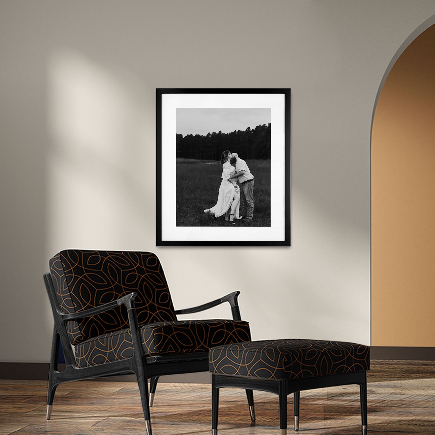 A series of dramatic black and white photos showing a modern lounge chair against a plain wall in different positions.