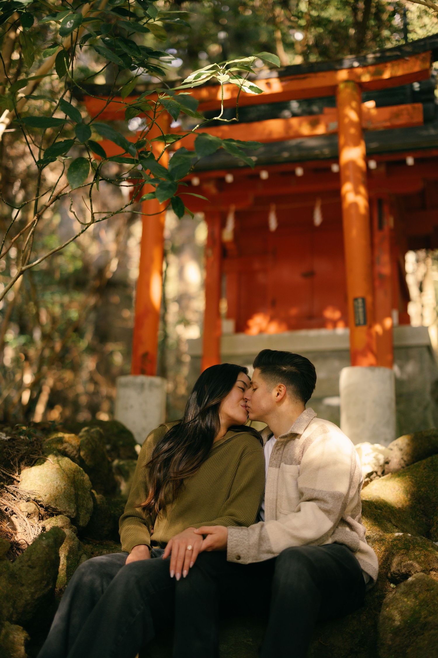 Couple engagement photo at red Torii gate at Hakone shrine