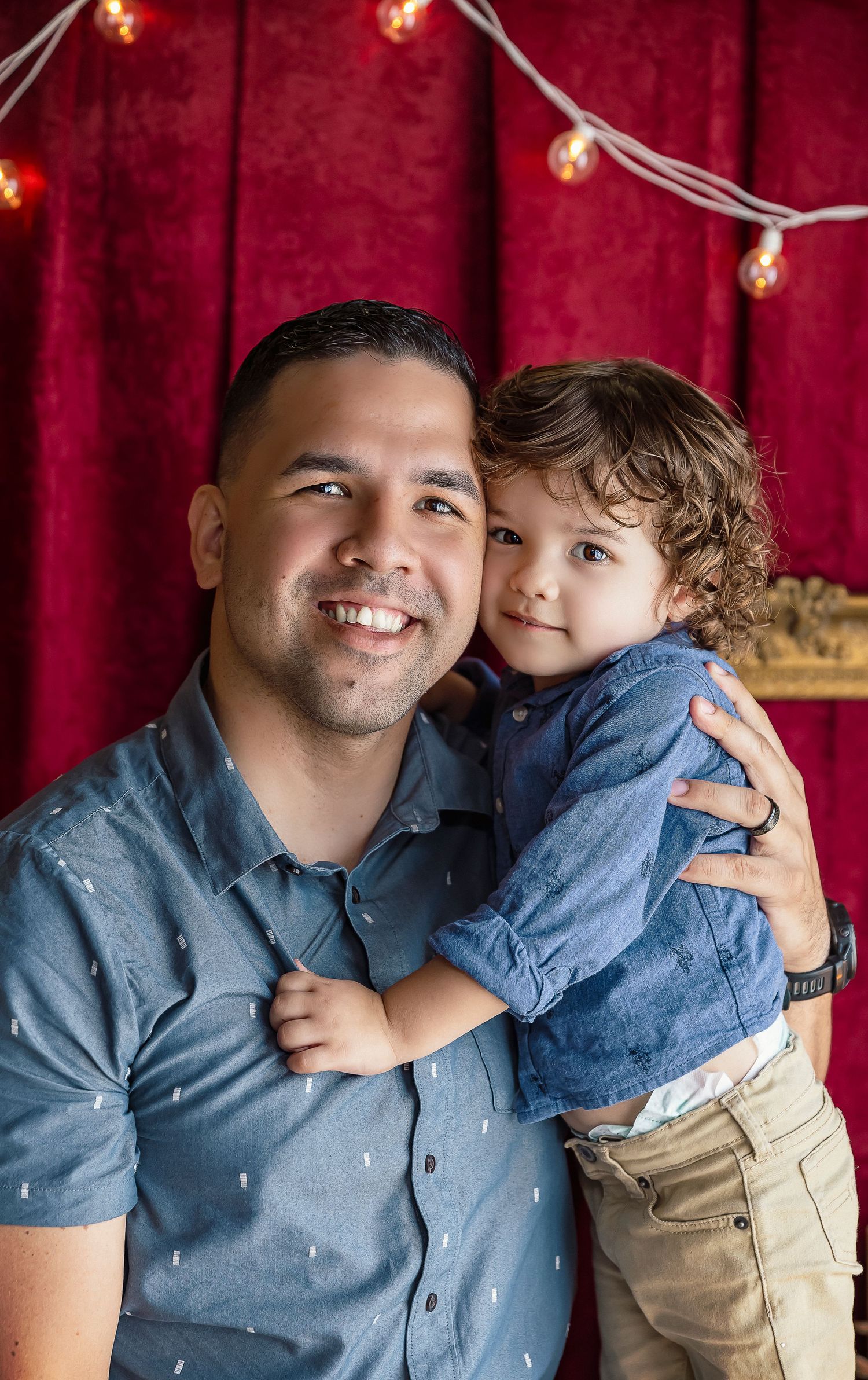 daddy and me photo little boy poses with dad in close up photo