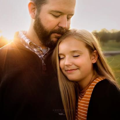 Father and daughter in field during golden hour in Springfield MO.