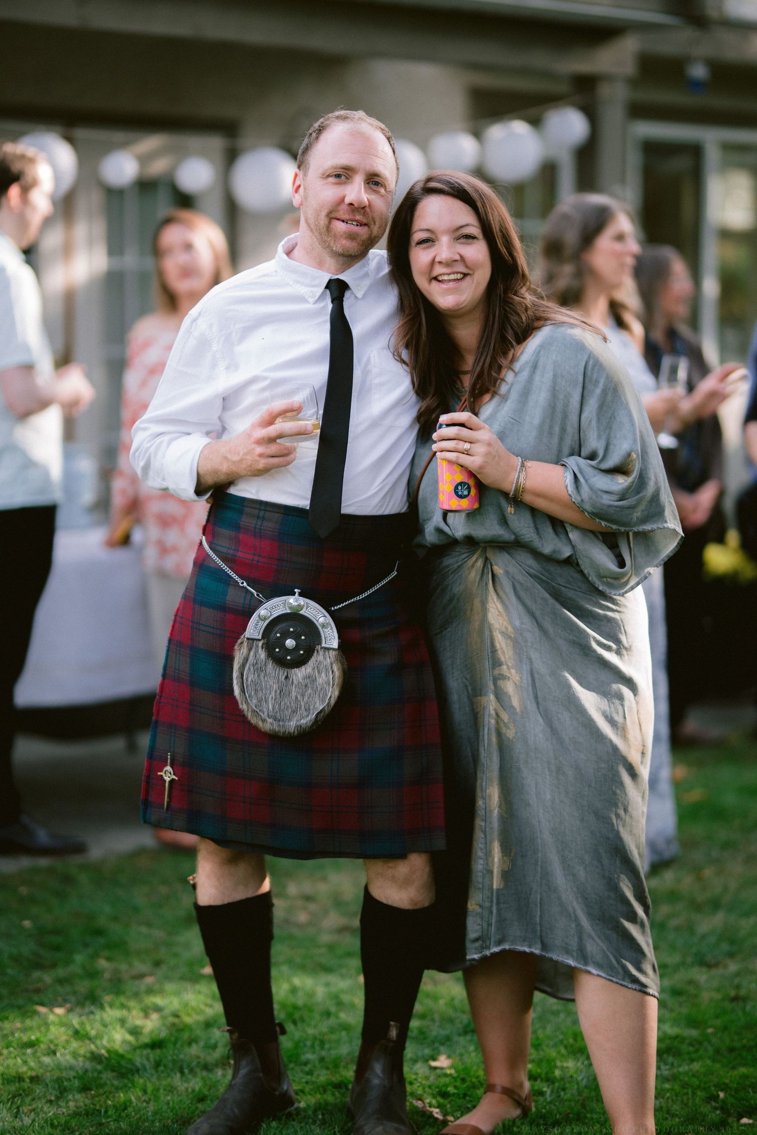Wedding celebration photos showing guests in kilts enjoying drinks and dancing outdoors.