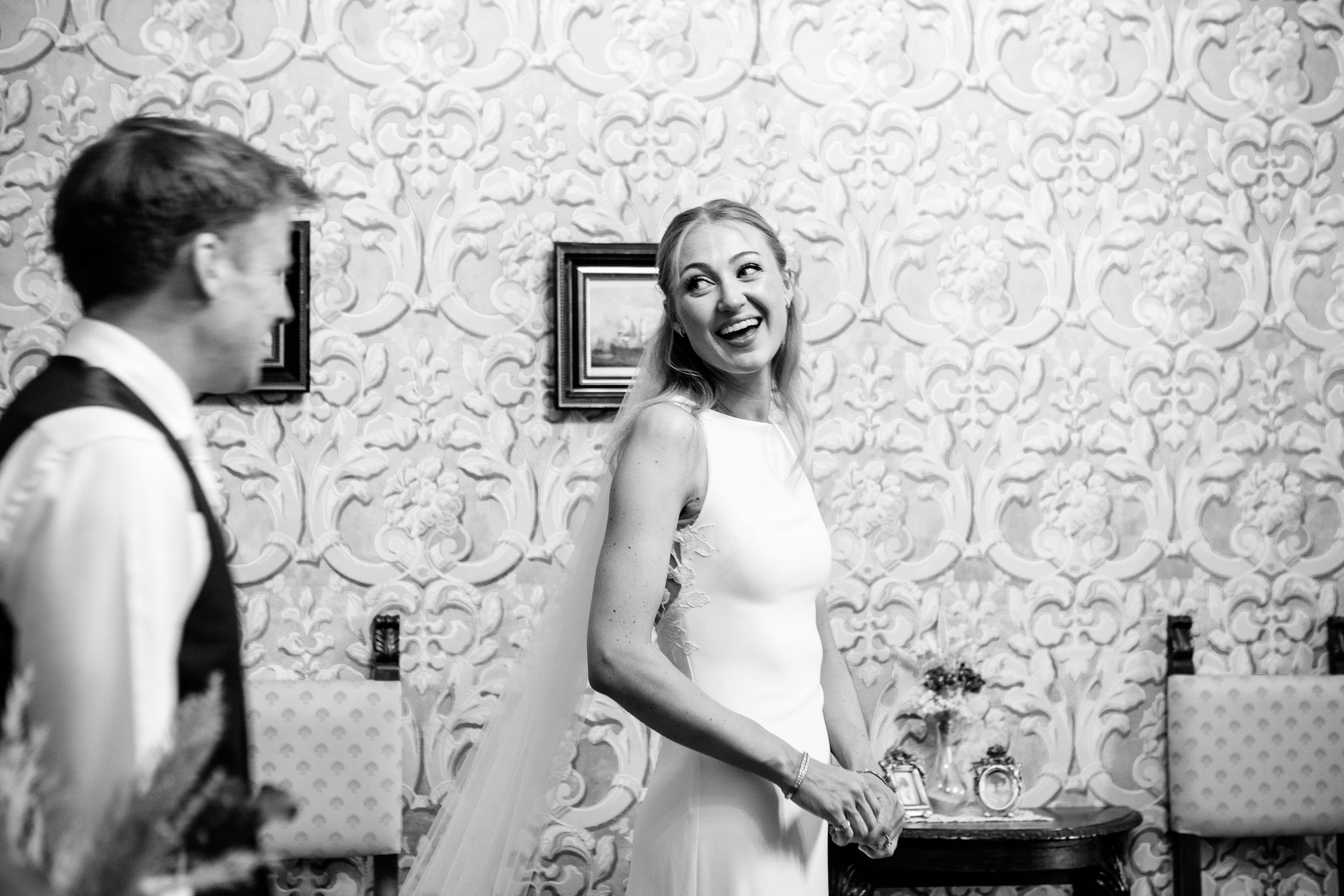 Black and white photo of a sweet first look at Hotel Borgo Casabianca, Asciano, Siena.