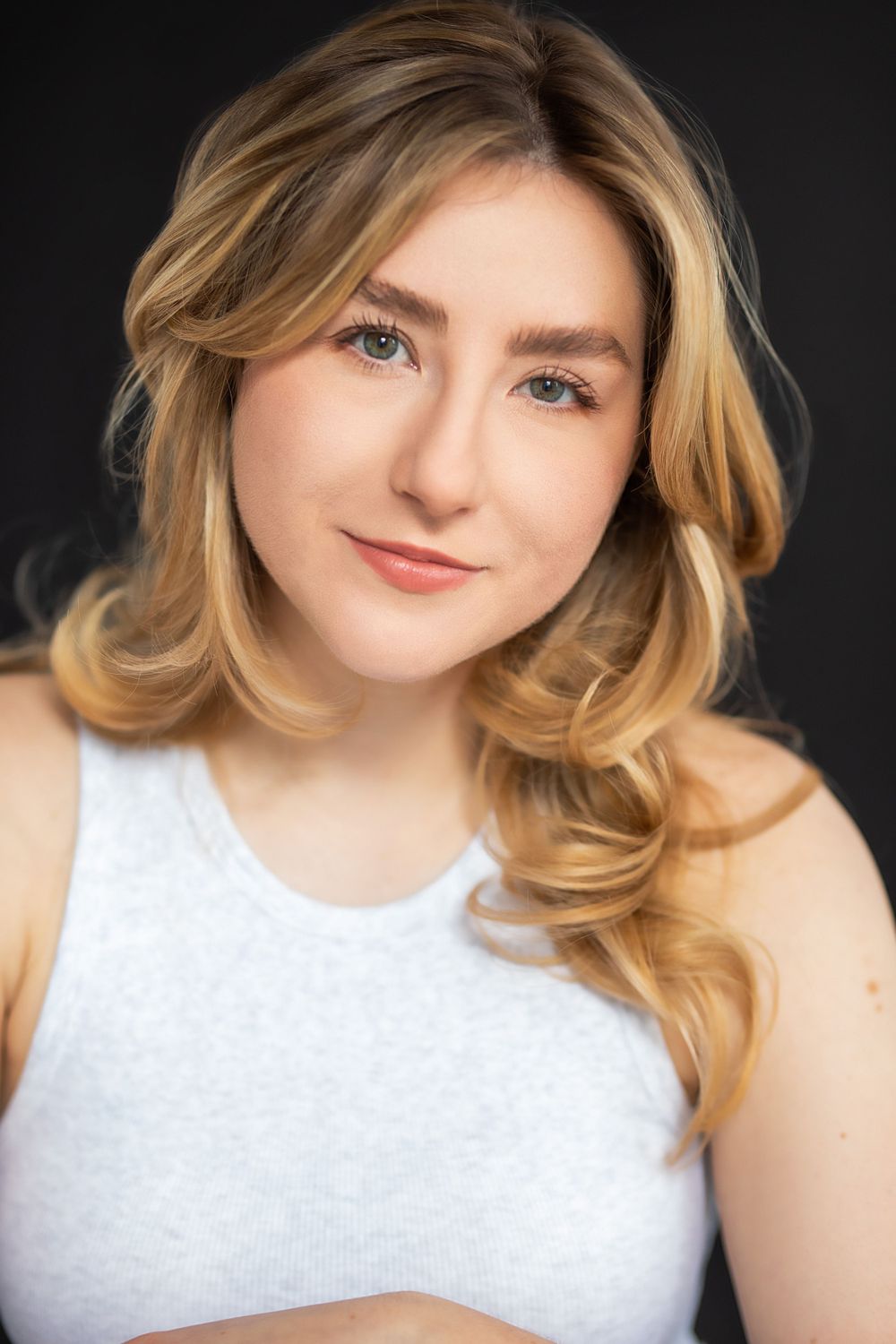 headshot photograph of Taylor Efford, diabetes advocate a young woman with blonde hair and blue eyes