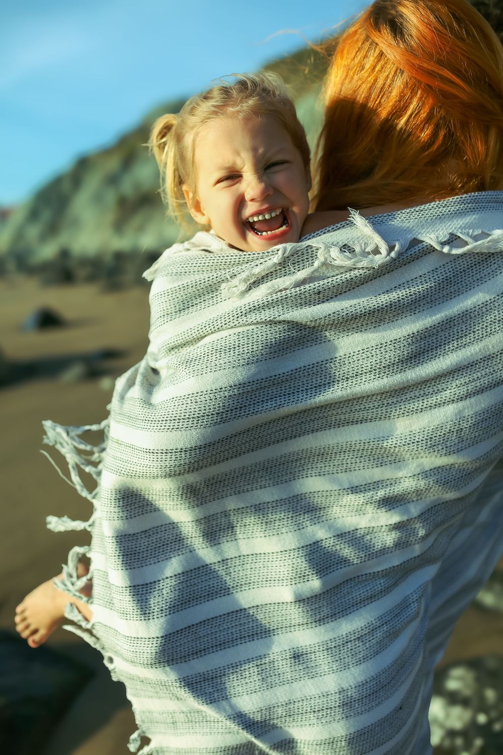 mother daughter golden hour beach photoshoot in San Francisco by the golden Gate Bridge