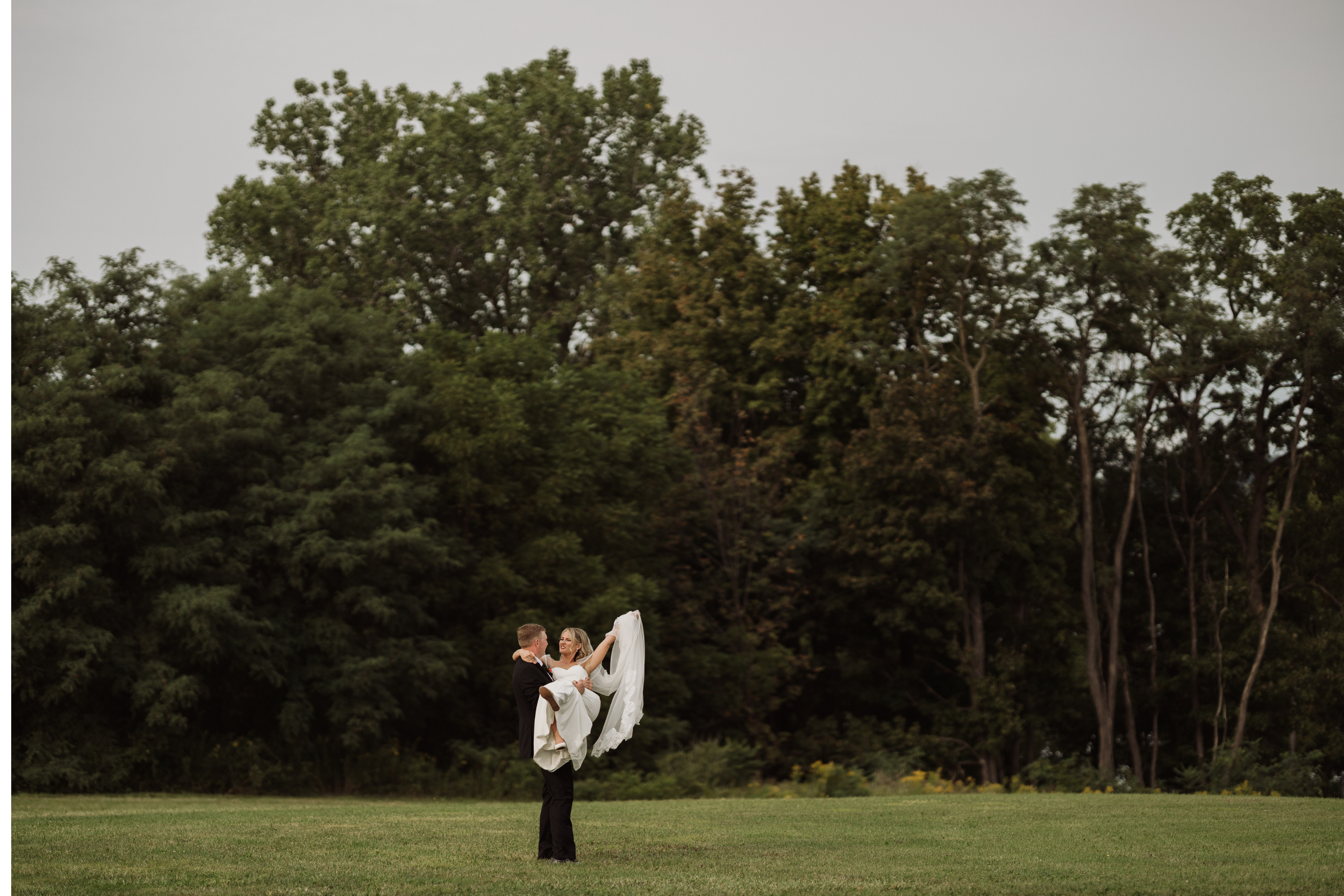 Natural wedding portraits of bride and groom during Finger Lakes wedding