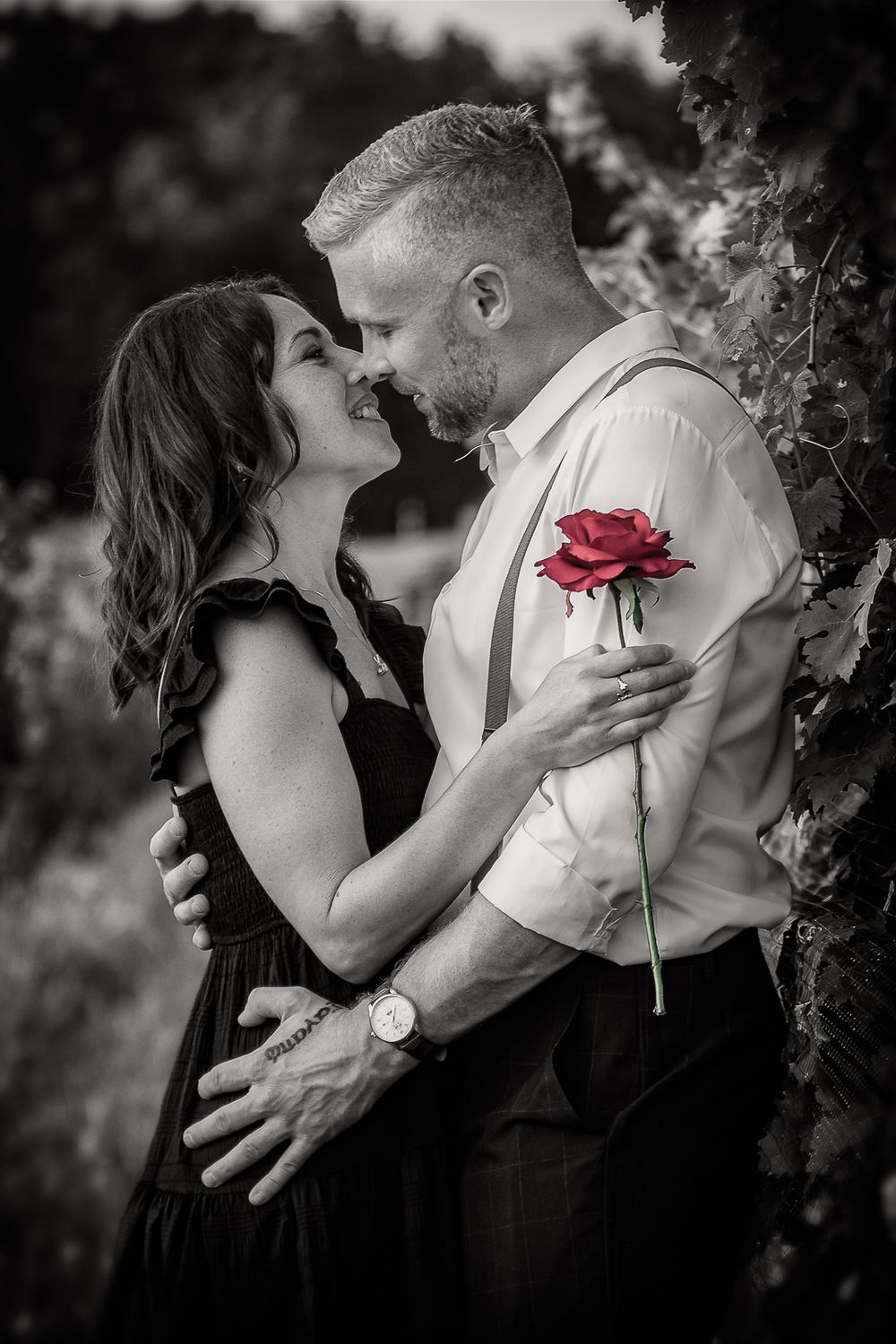 Black and white photo series showing intimate romantic moments between a couple.