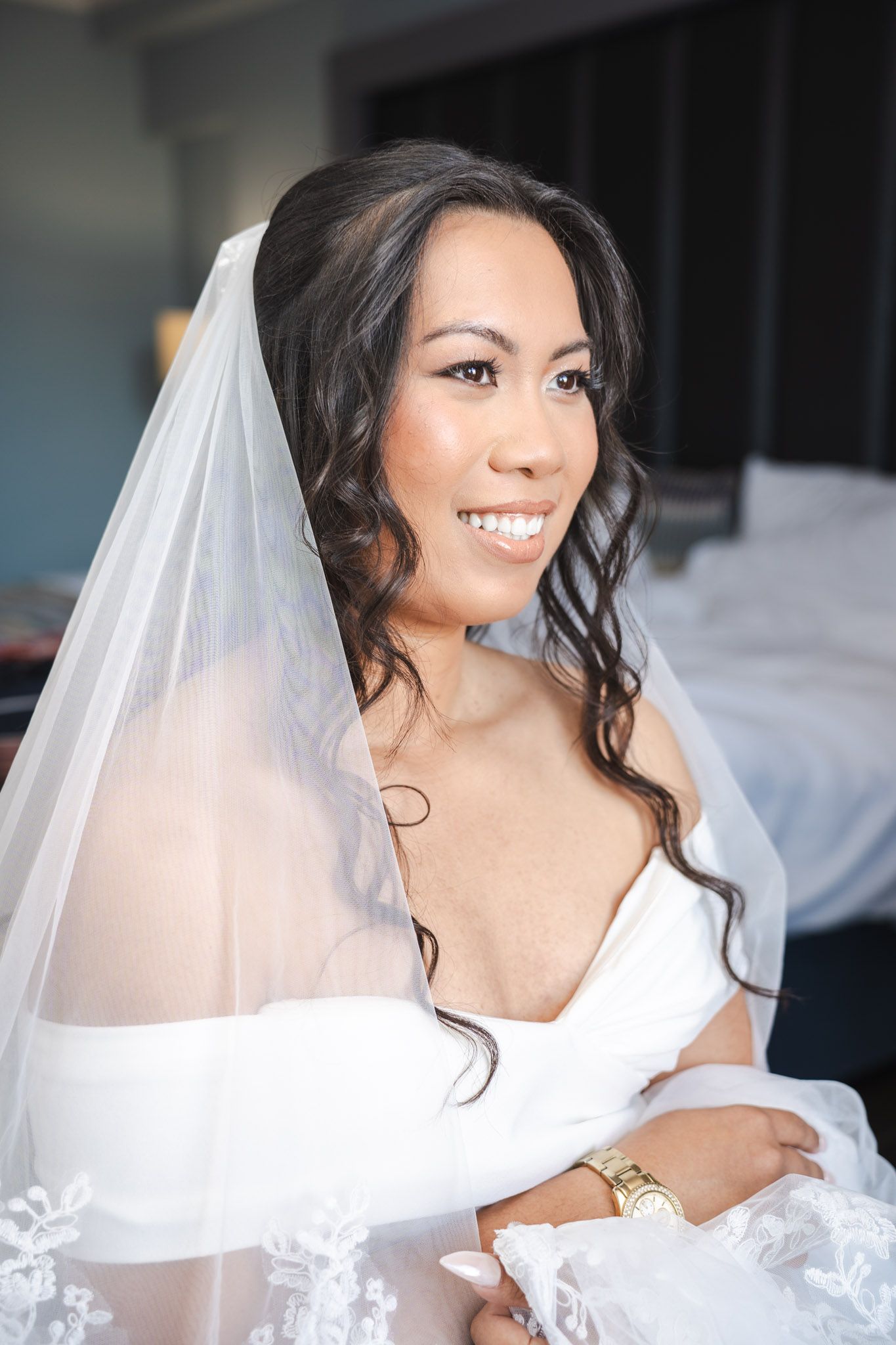 Gibraltar bride smiles while bearing for Wedding in Elliot hotel