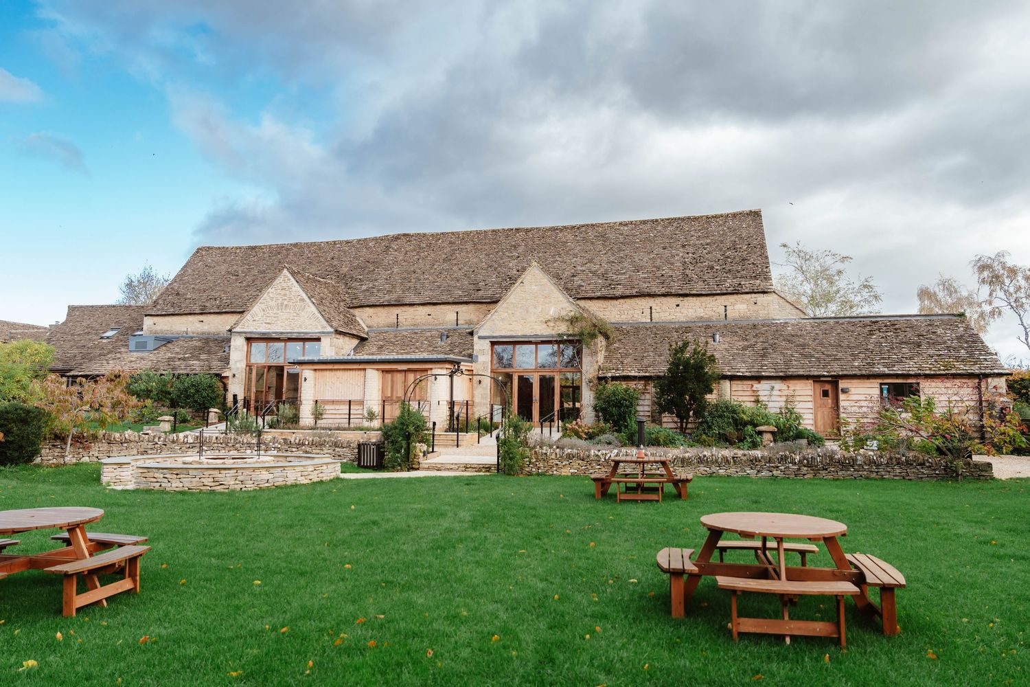 The Great Tythe Barn Tetbury wedding venue gardens in the Cotswolds Cheltenham