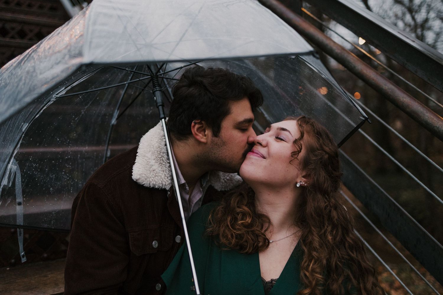 finley farms rainy engagement by the bridge