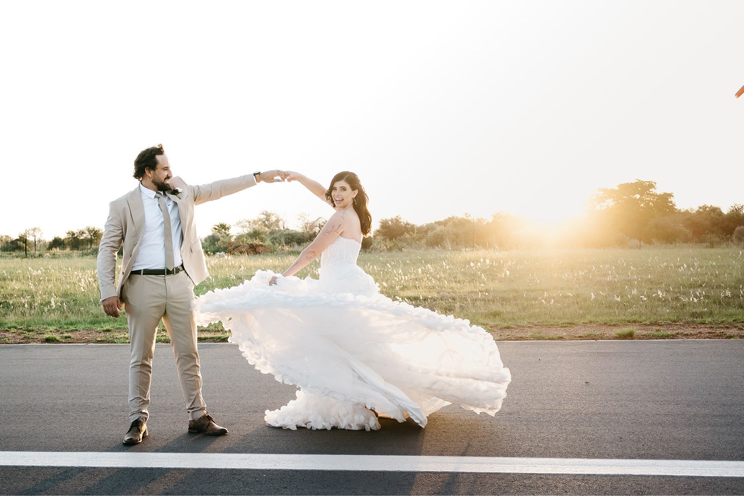 girl twirling around and looking happy in her purple dress for her engagement shoot at Campaign Living in South Africa
