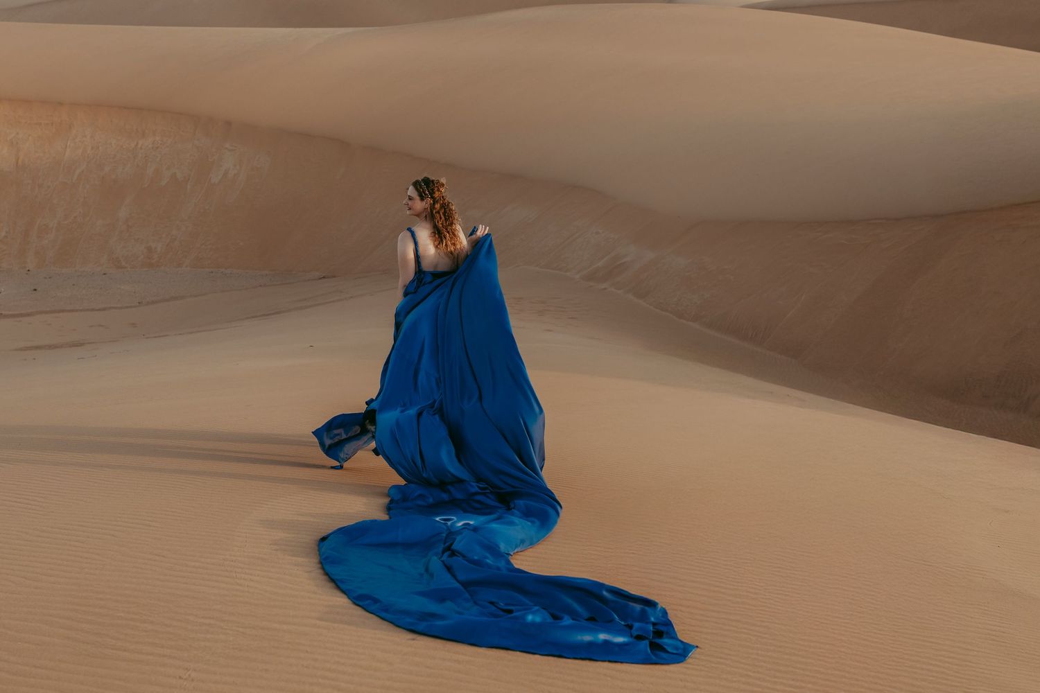 Flying dress photoshoot in the dunes near Swakopmund