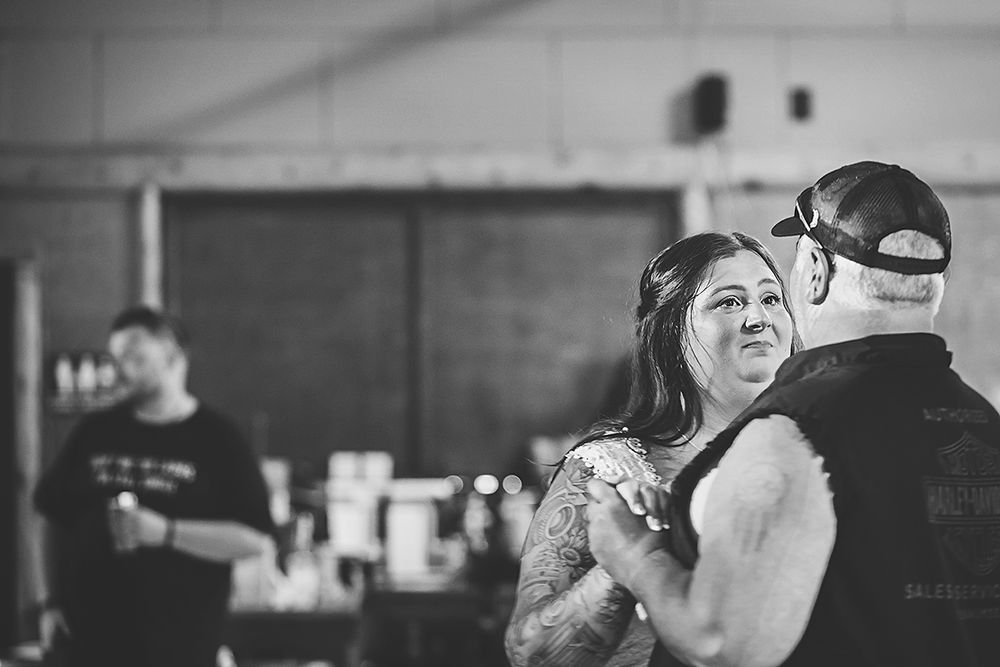 A black and white collage of eight photos showing people dancing and socializing at what appears to be a party or event.