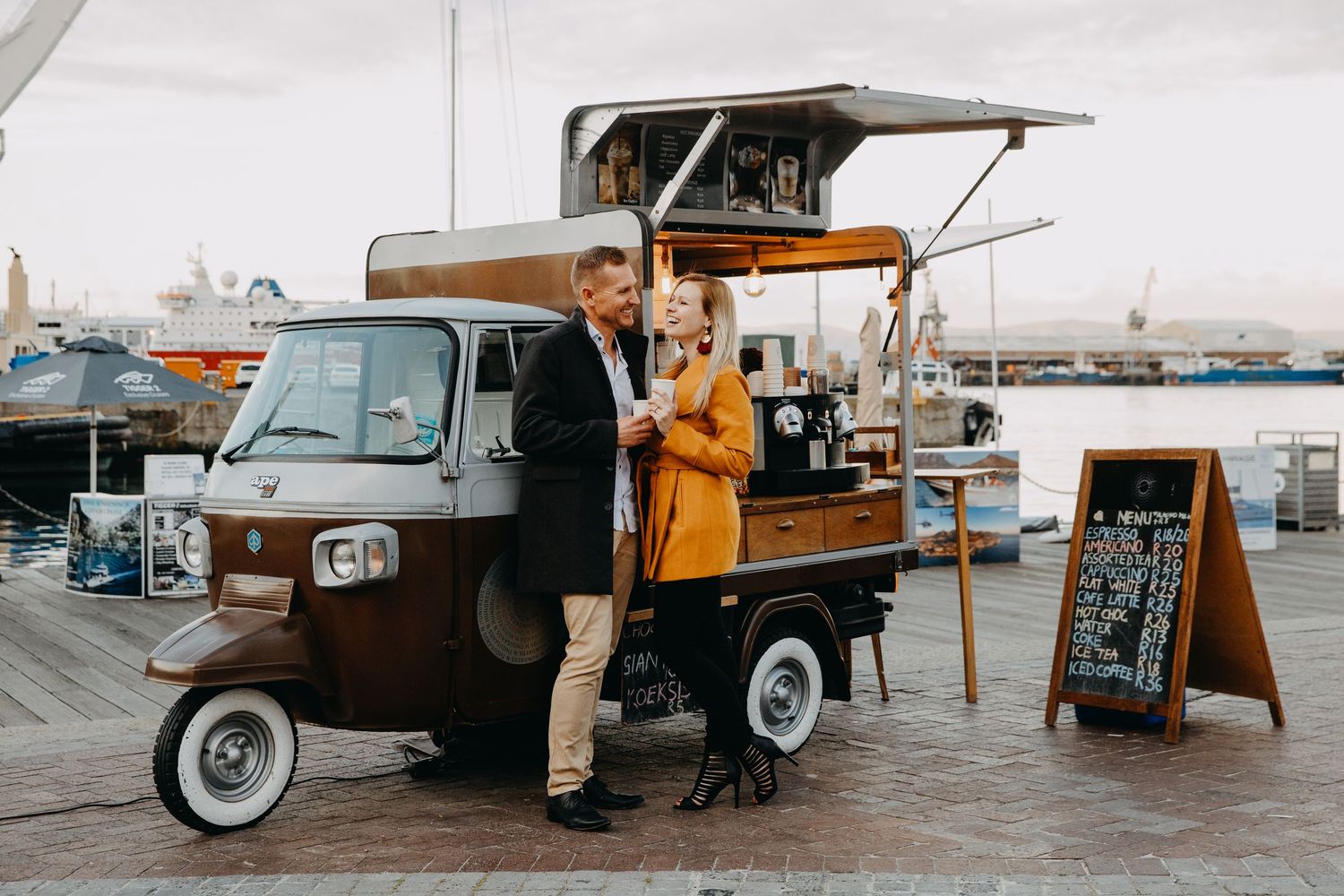 Five vintage lifestyle photos show a retro-styled coffee shop with classic cars and outdoor seating arrangements.