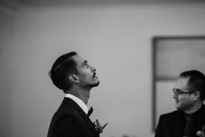 A sequence of black and white profile shots showing figures gazing upward in an artistic composition.
