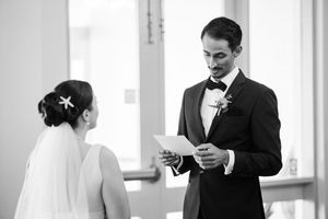 Black and white image series of a couple sharing intimate moments during their wedding day preparations.