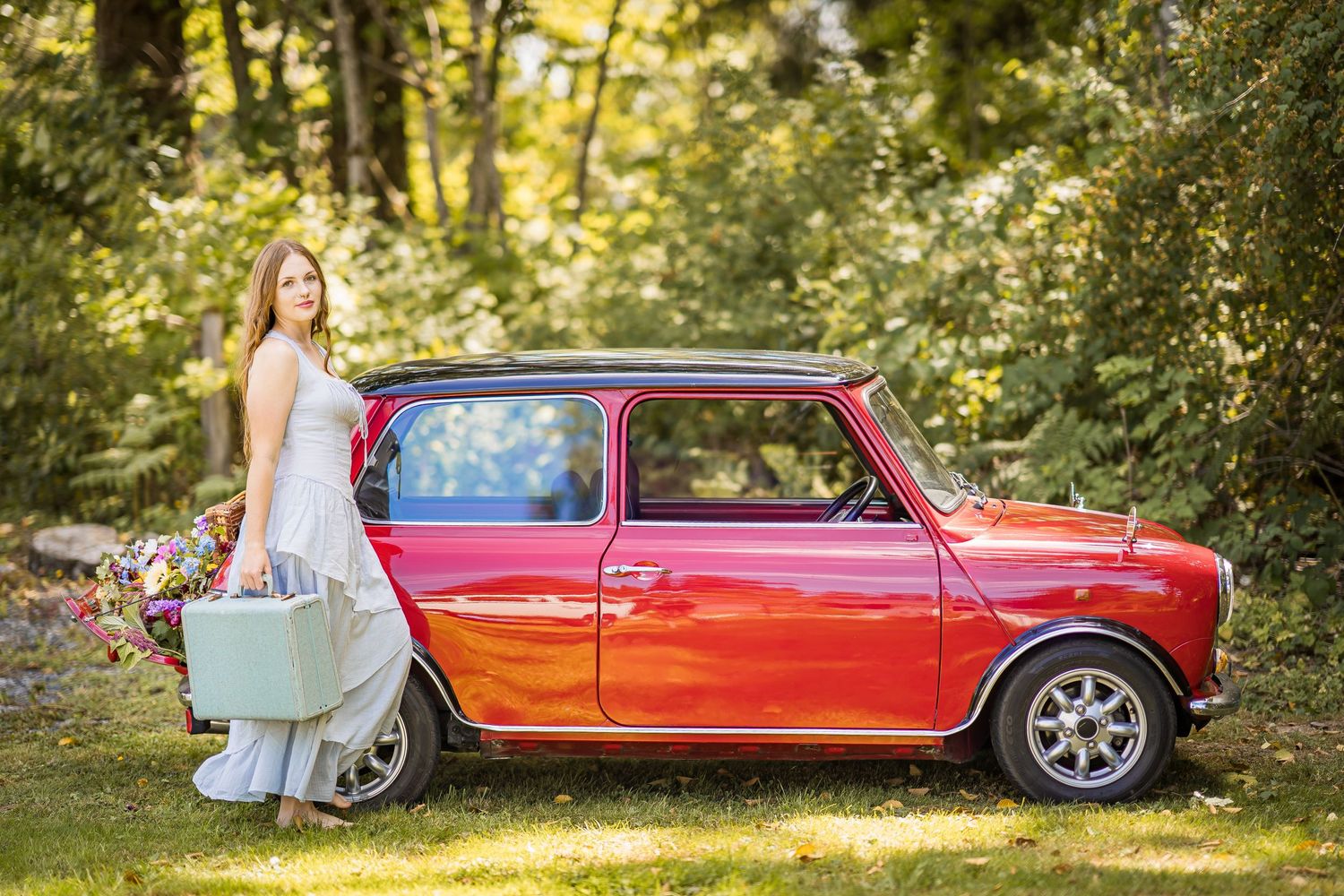 styled photography senior mini session with red classic mini Cooper car and seasonal flowers