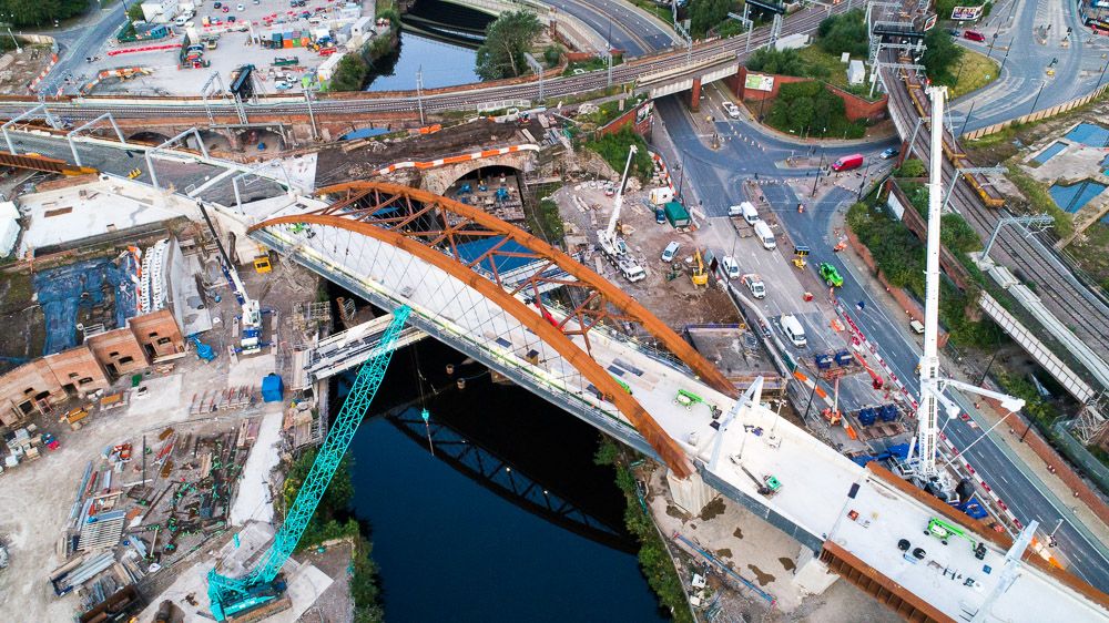 Drone photograph of Ordsall Chord Network Arch Railway Bridge under construction, Manchester