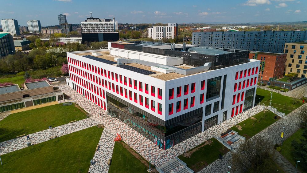Architectural drone photograph of SEE Building, Salford University
