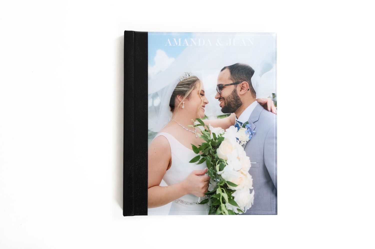 Wedding photo album cover with romantic beach portrait.