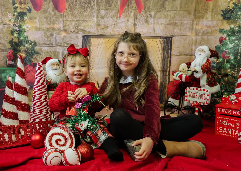 A festive holiday photo collage showing Christmas decorations, red backdrops, and candy cane props in a studio setting.