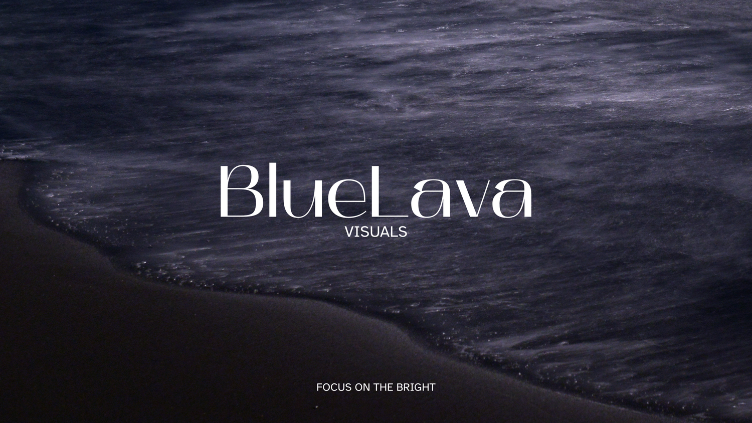 Ocean waves breaking at shoreline with BlueLava Visuals text overlay.