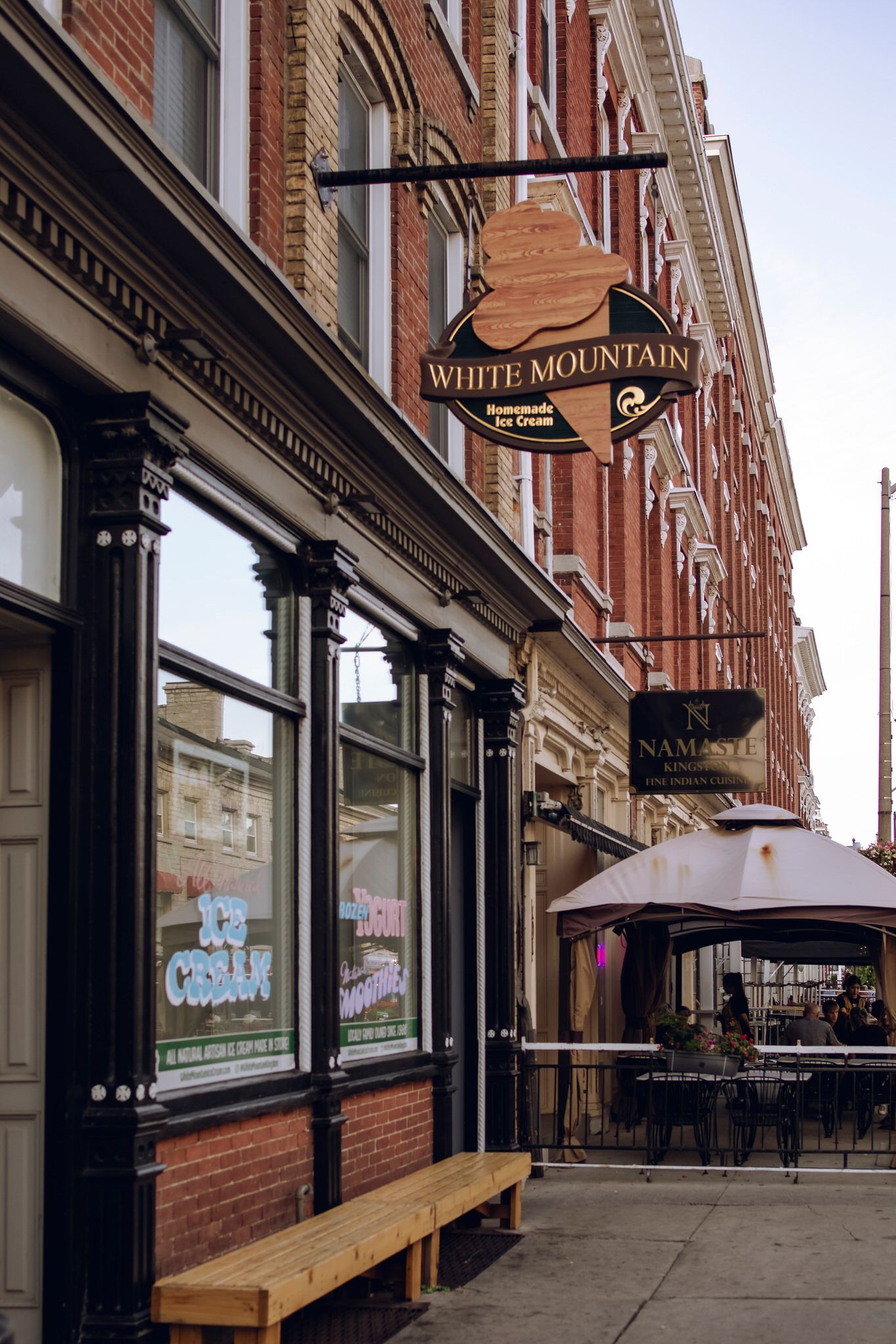 Historic downtown Kingston storefront of White Mountain Ice Cream, ideal for cinematic photography sessions and small business collaboration