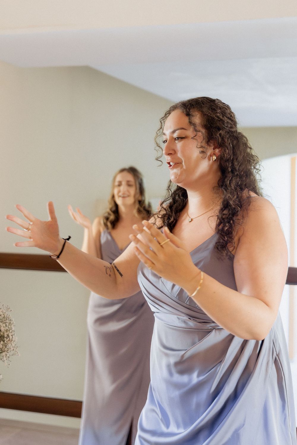 Bridesmaids react to dress reveal candid moment wedding photography Mexico Playa Del Carmen wedding photography packages resort wedding