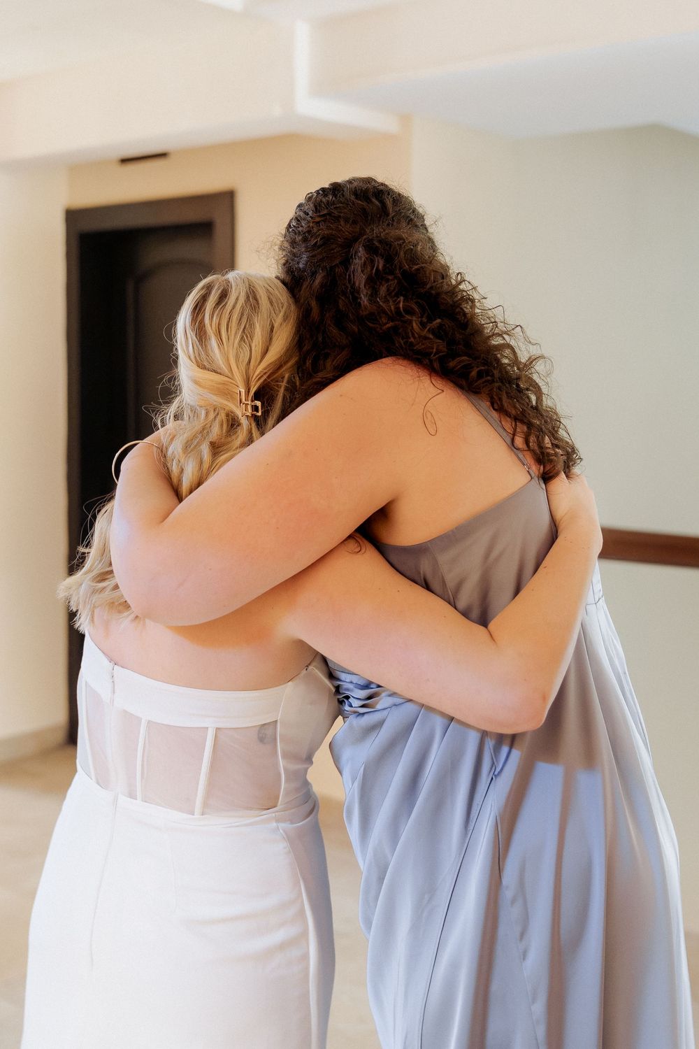 Bride and bridesmaid candid moment photography Mexico wedding photography Riviera Maya Mexico wedding photographer Barcelo Maya Palace