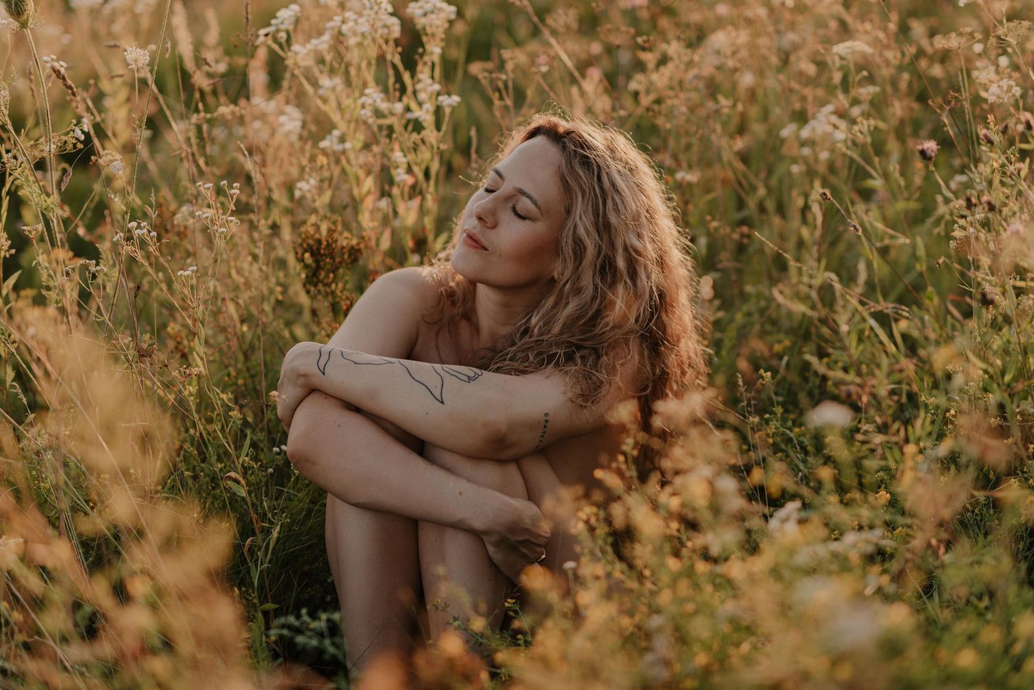 Dreamy portrait sequence captured in a golden wildflower meadow at sunset.