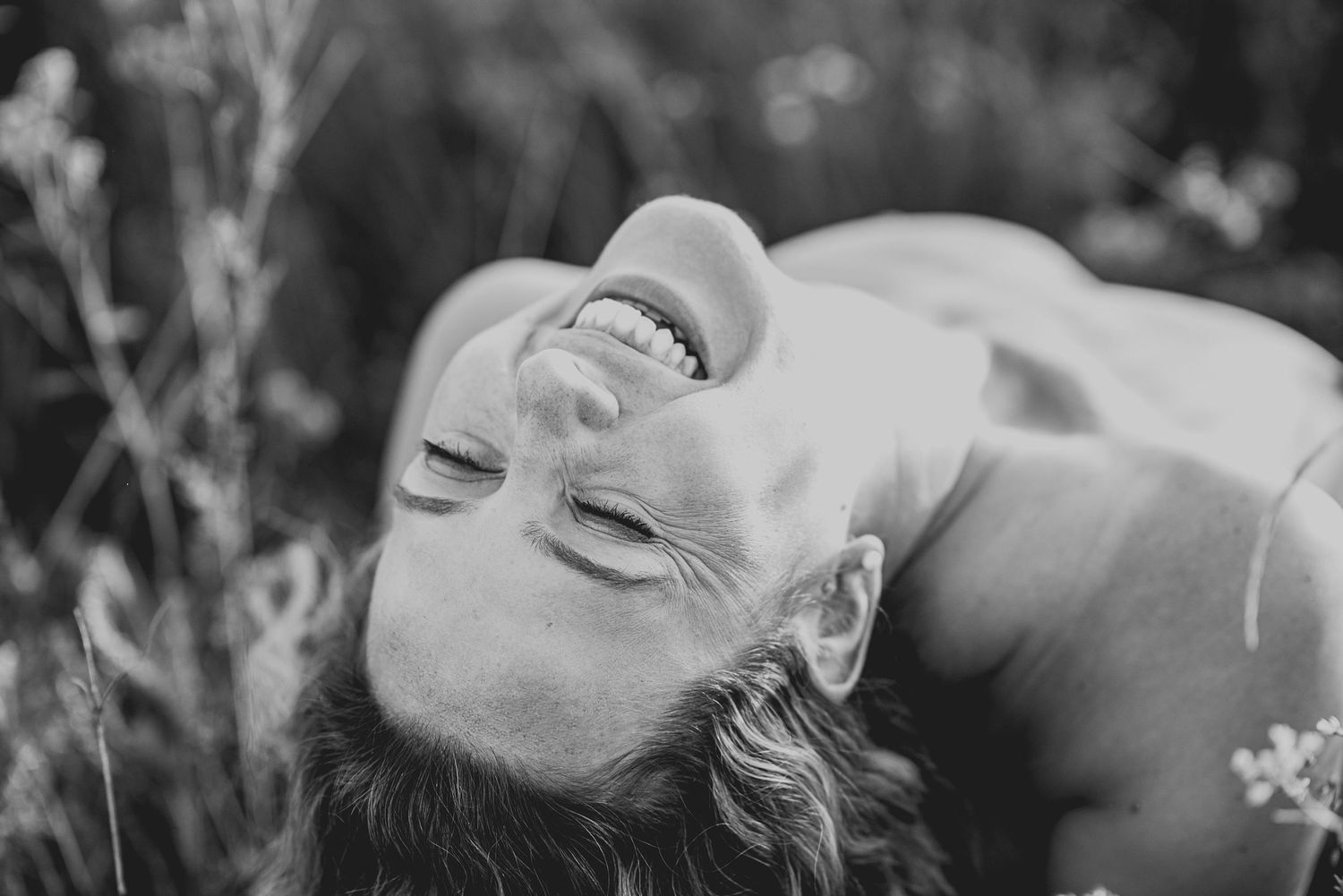 A monochromatic collection of close-up romantic portraits showing tender embraces and intimate moments between couples.