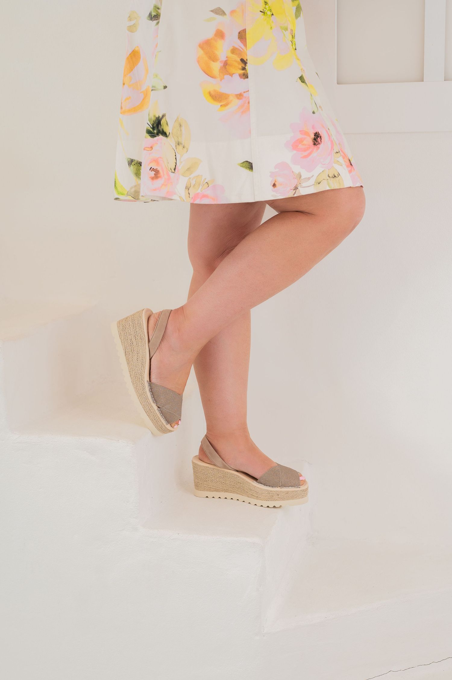 Beige espadrille wedge sandals shown from multiple angles on light background.