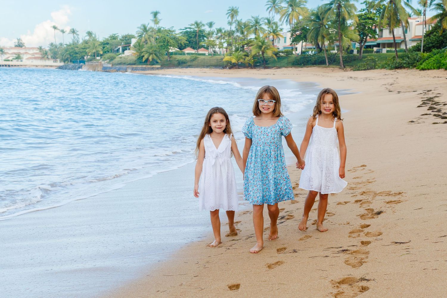 Three girls on the beach in Dorado, Puerto Rico.