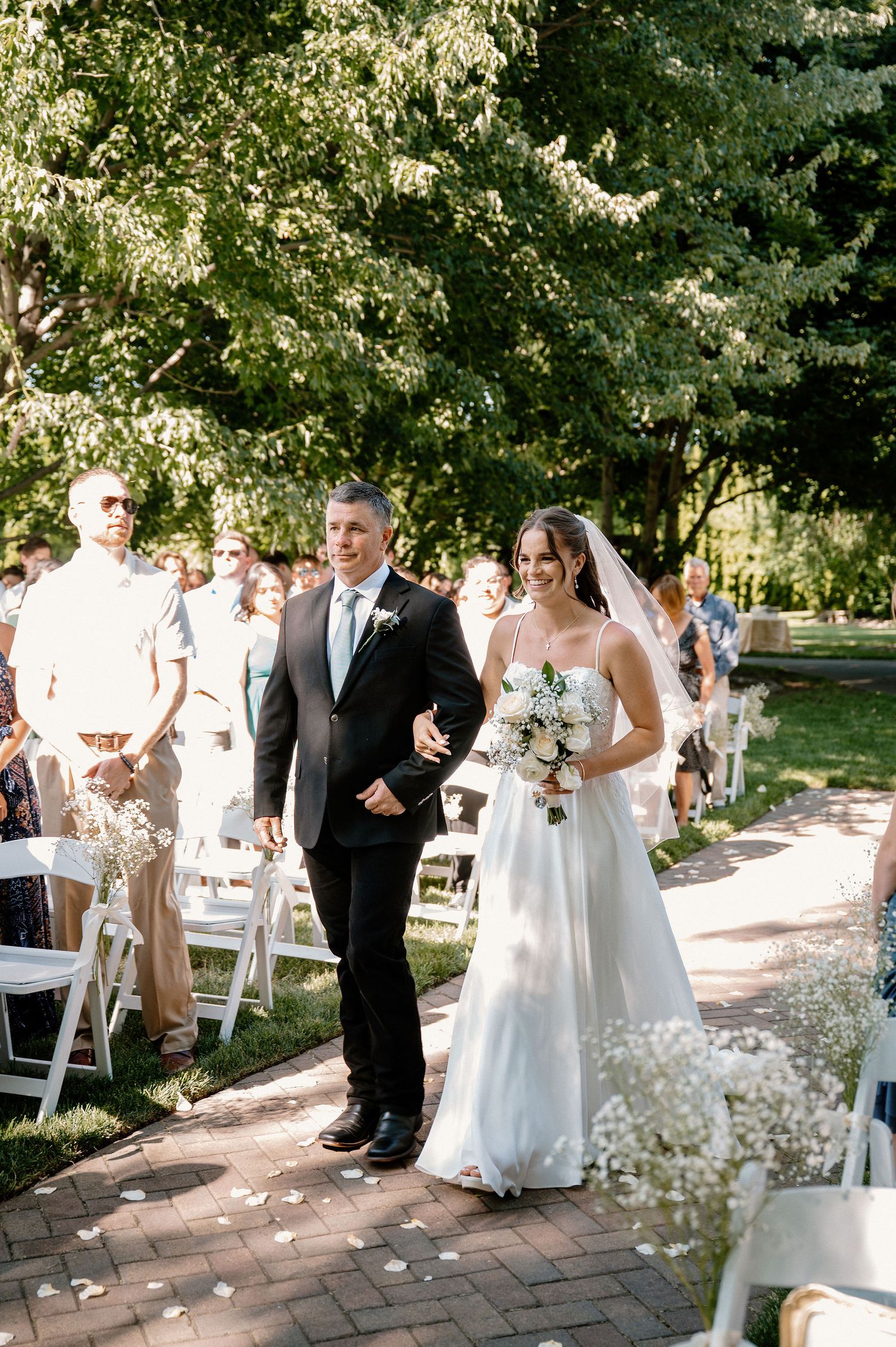 Summer wedding ceremony at Promise Garden in Pasco