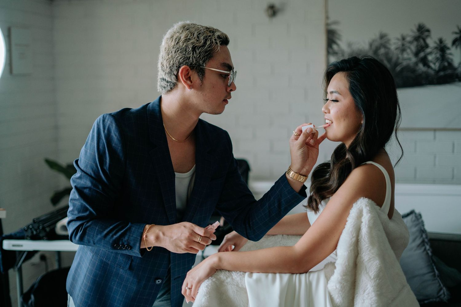 A couple shares intimate moments together in a series of candid black and white photographs.