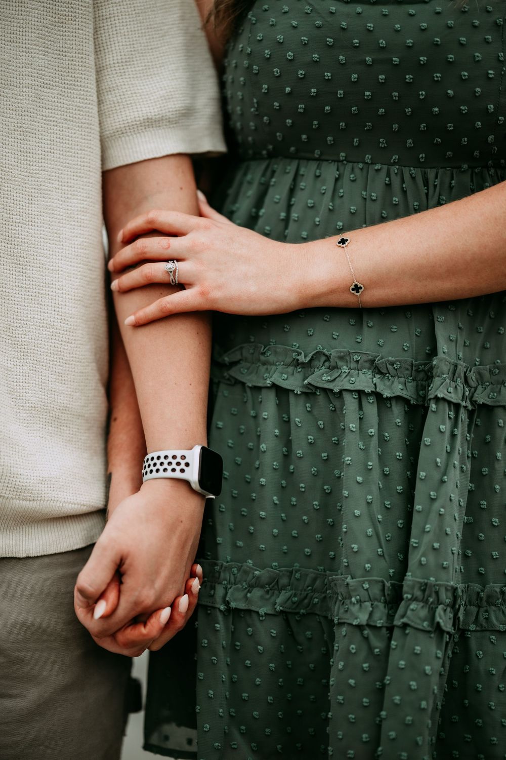 Series of intimate moments showing couple holding hands, focusing on green dotted dress details.
