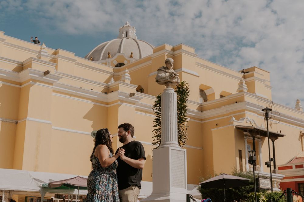 A series of connected wedding photos showing an outdoor ceremony at a yellow stucco venue with white accents.