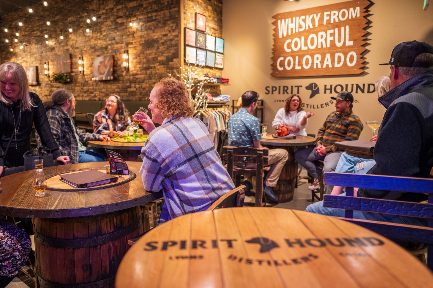 Shot of Spirit Hound Distillers' customers enjoying drinks by Denver Hospitality, Travel & Tourism photographer Captain Colorado Photography