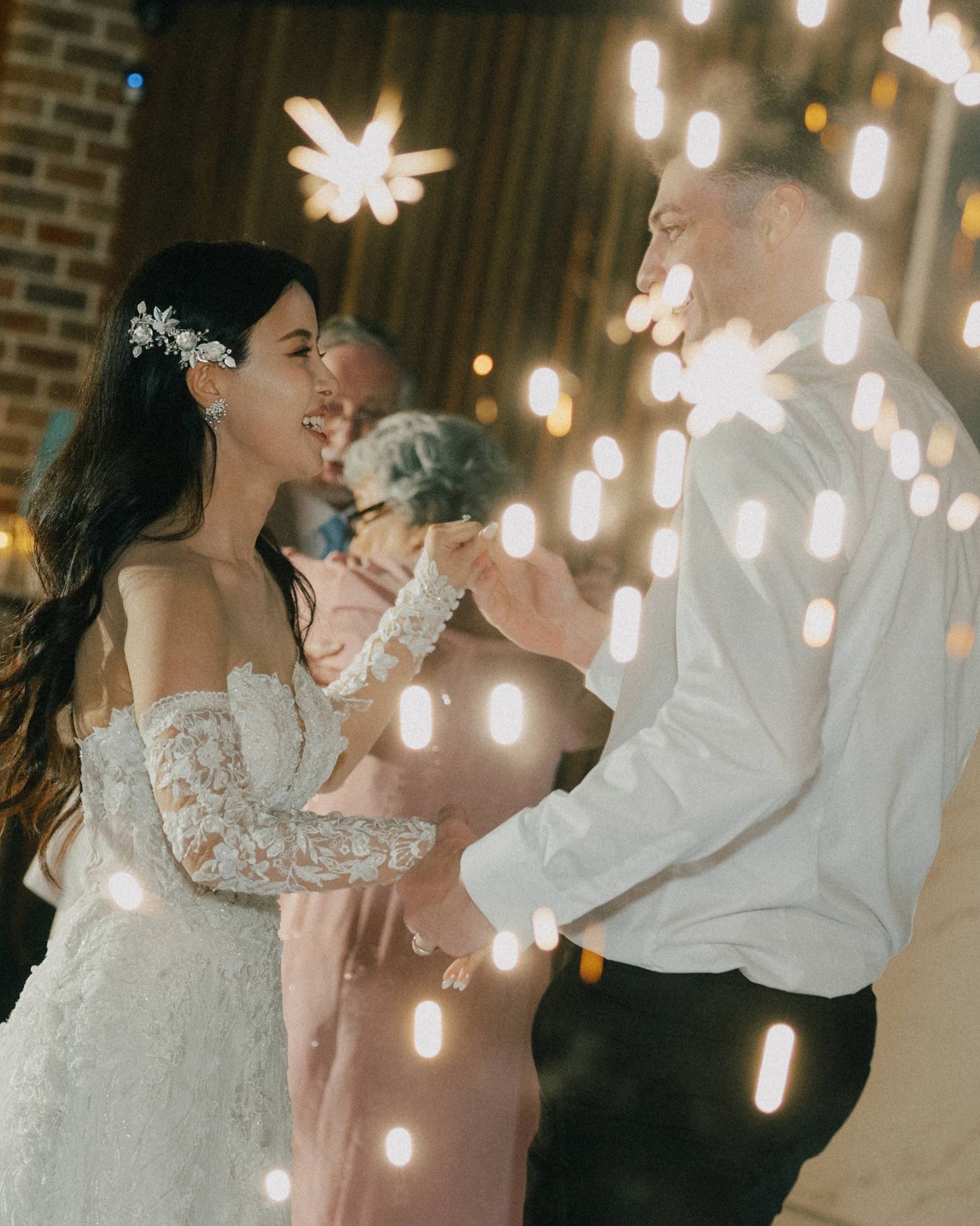 "First dance under chandeliers at The Valley Estate wedding reception"