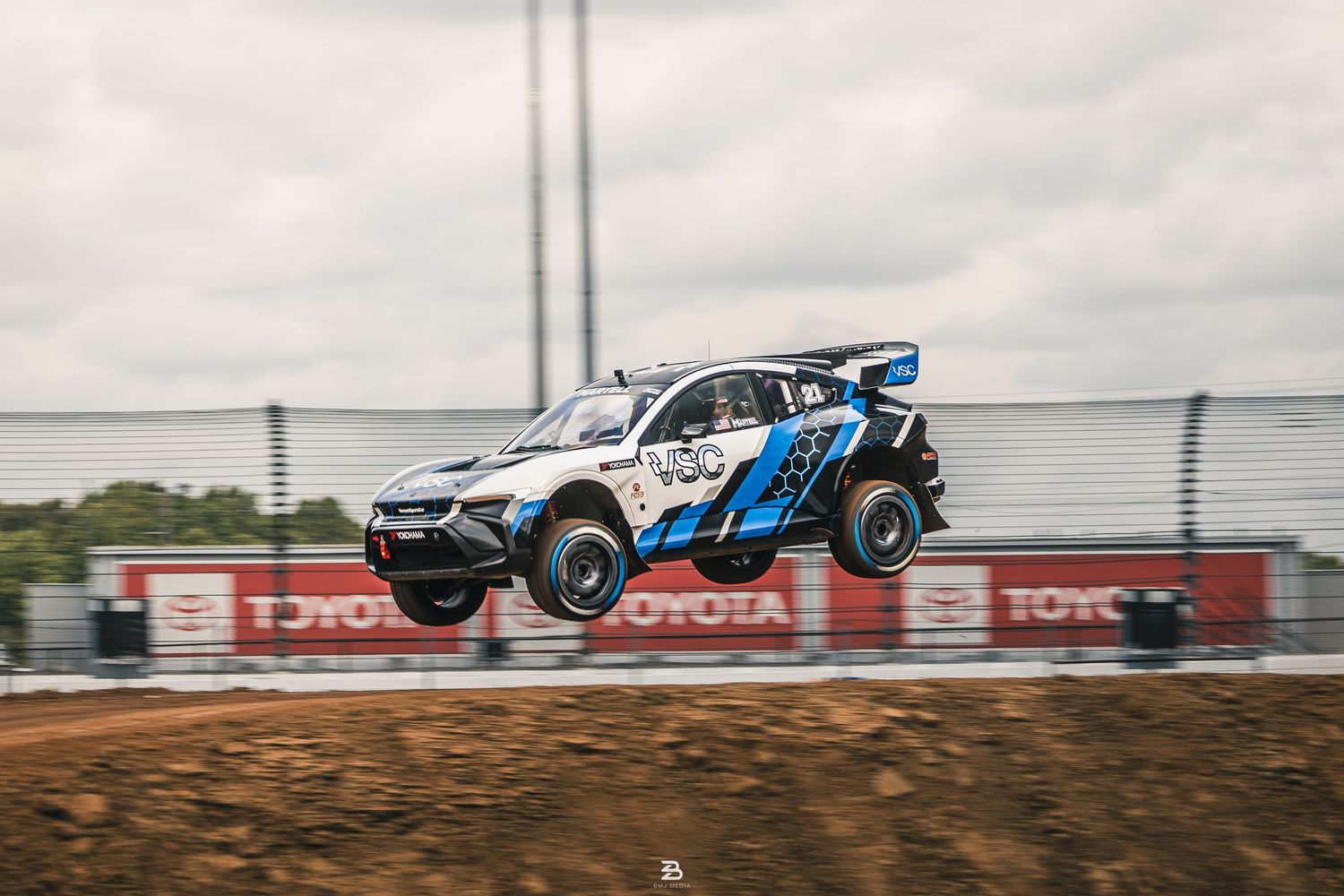 White Dodge Hornet rally car racing at Nitrocross 2024 event